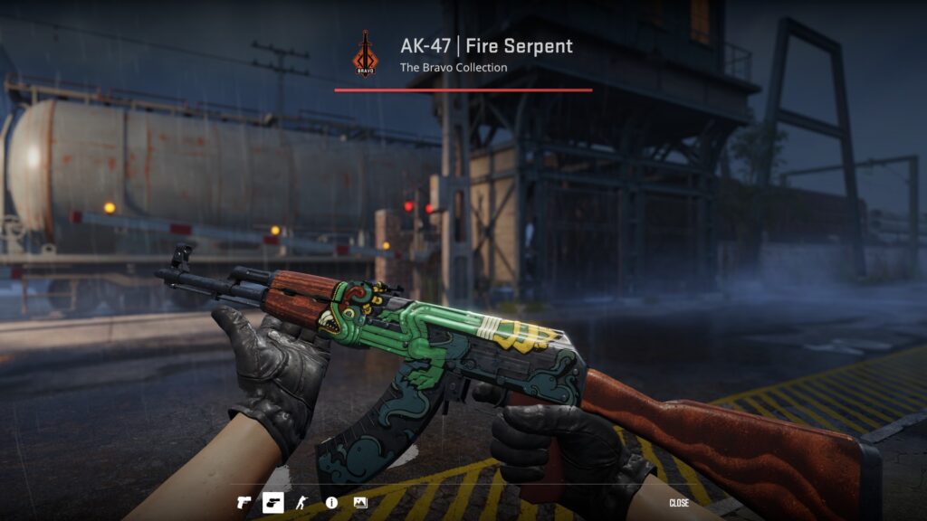 one of the best AK-47 skins in the game - Fire Serpant, being inspected on the map Train