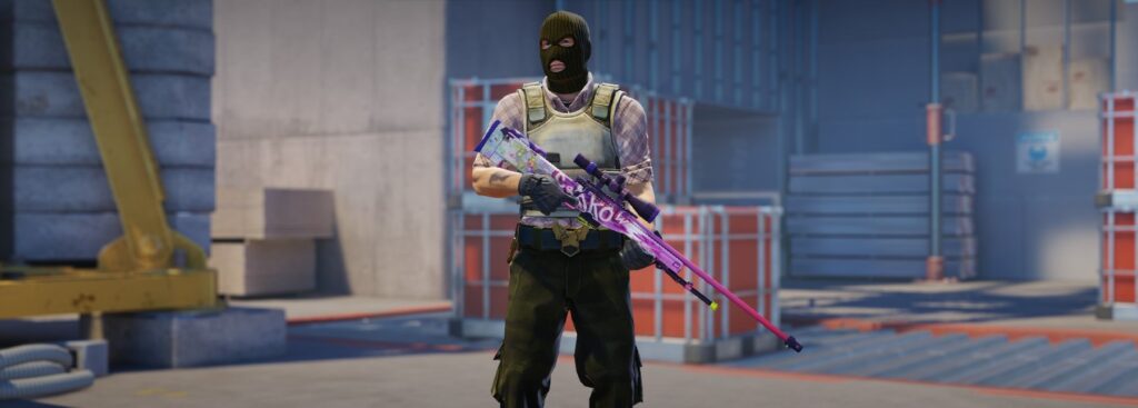 a T agent holding AWP Crakow! - one of the more vibrant AWP skins under $50 on Vertigo