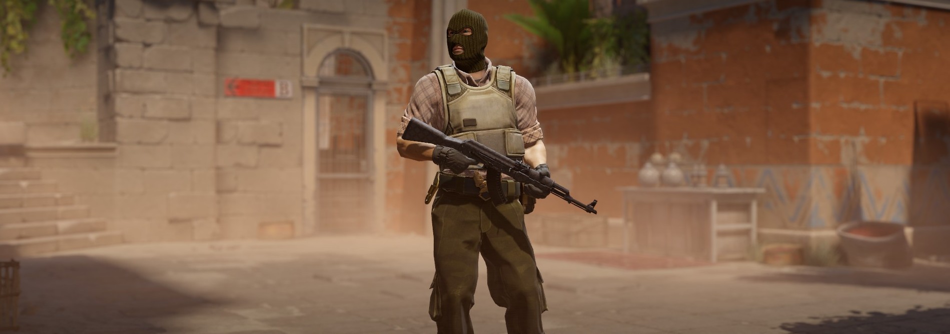 T agent on Anubis holding the Baroque Purple, one of the cleaner looking AK-47 skins under $20